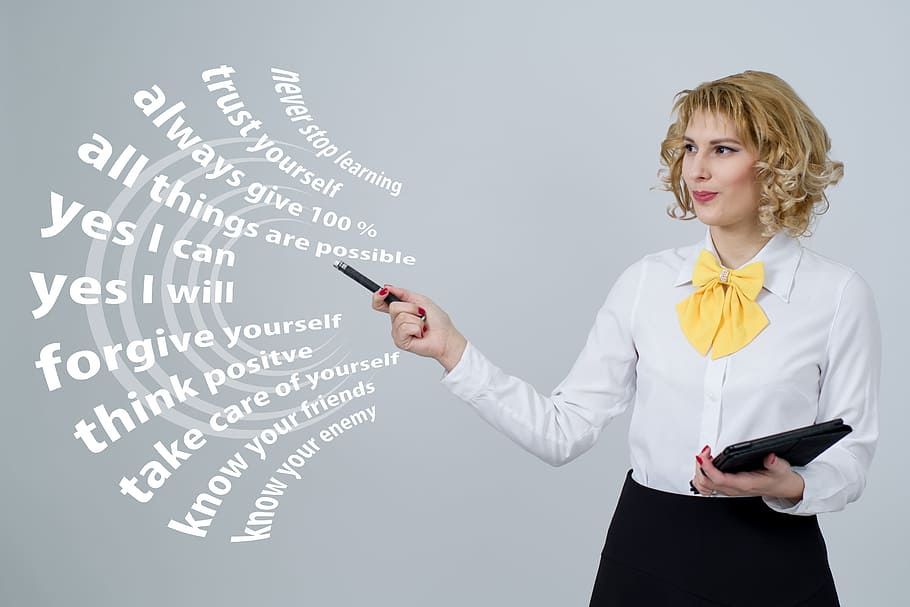 woman wearing white dress shirt with text overlay, successful