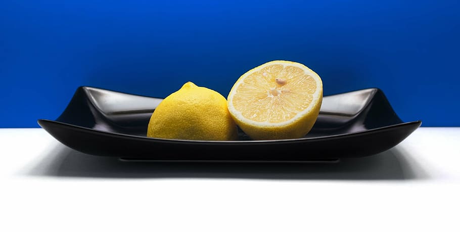 lemon, fruit, black plate, blue background, fresh, citrus, citrus Fruit HD wallpaper