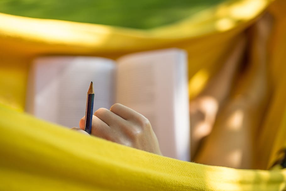 Woman studying and reading with pencil in garden, various, college HD wallpaper