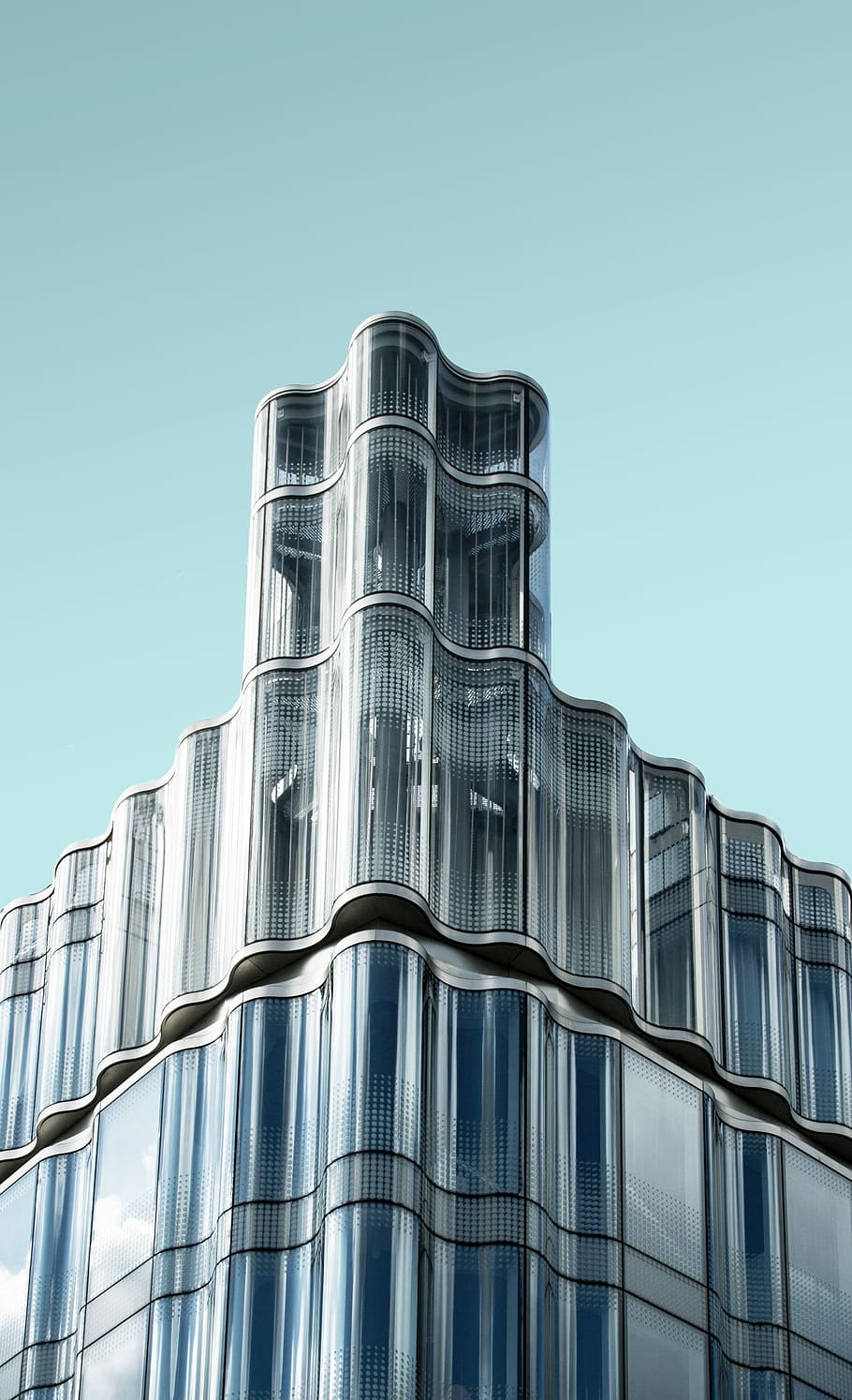 gray building during daytime, blue and white city building under clear sky during daytime HD wallpaper