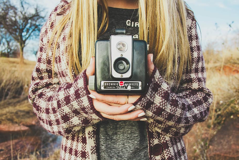person holding black and gray camera, woman, vintage camera HD wallpaper