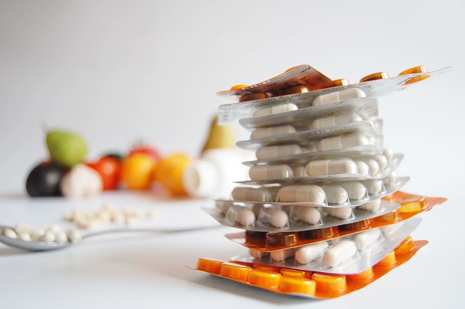 white and orange medicine blister packs stacked, health, cure HD wallpaper