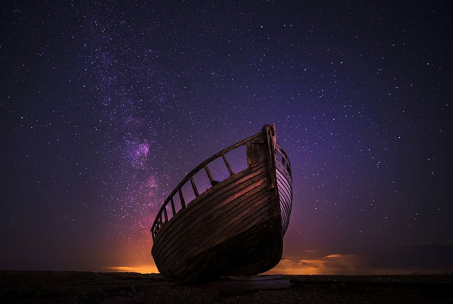 silhouette photography of sailing boat on body of water, brown wooden boat on seashore HD wallpaper