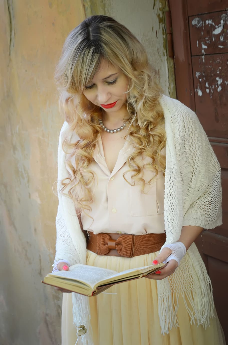 woman wearing white knitted headscarf and beige bow-accent dress holding book, HD wallpaper