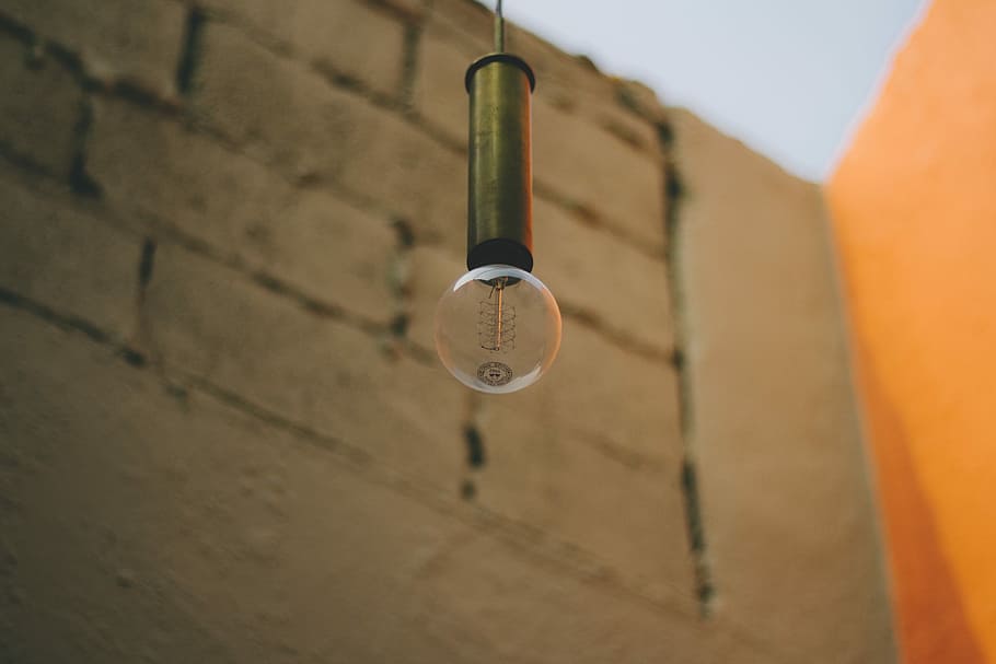 incandescent light bulb, clear light bulb near wall, brick, room HD wallpaper
