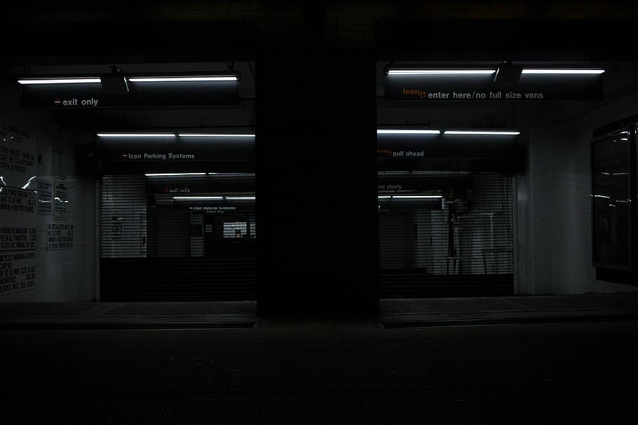 gray roll-up gate, building, lights, dark, car park, architecture HD wallpaper