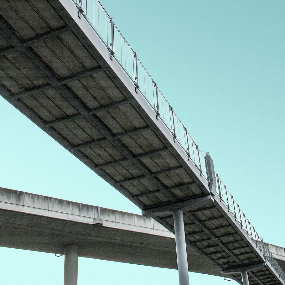 gray concrete bridge, bottom's eyeview of gray suspension bridge HD wallpaper
