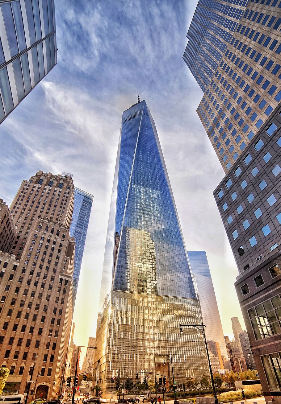low angle photo of high rise building, low-angle photography of high-rise buildings under blue and white sky at golden hour HD wallpaper