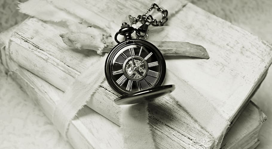 grayscale photography of pocket watch on books, worn, old, time