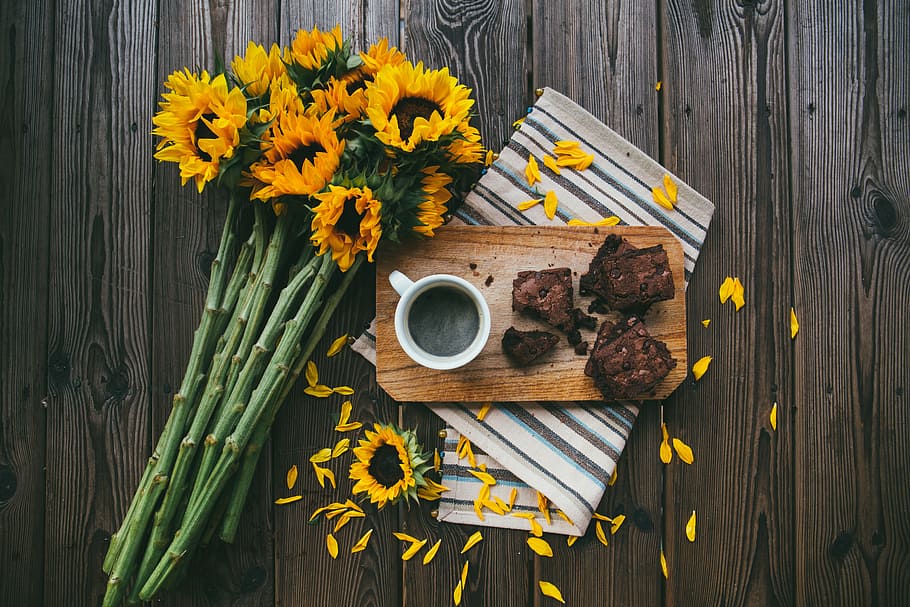 sun flower on wooden board beside coffee cup and grilled meat HD wallpaper