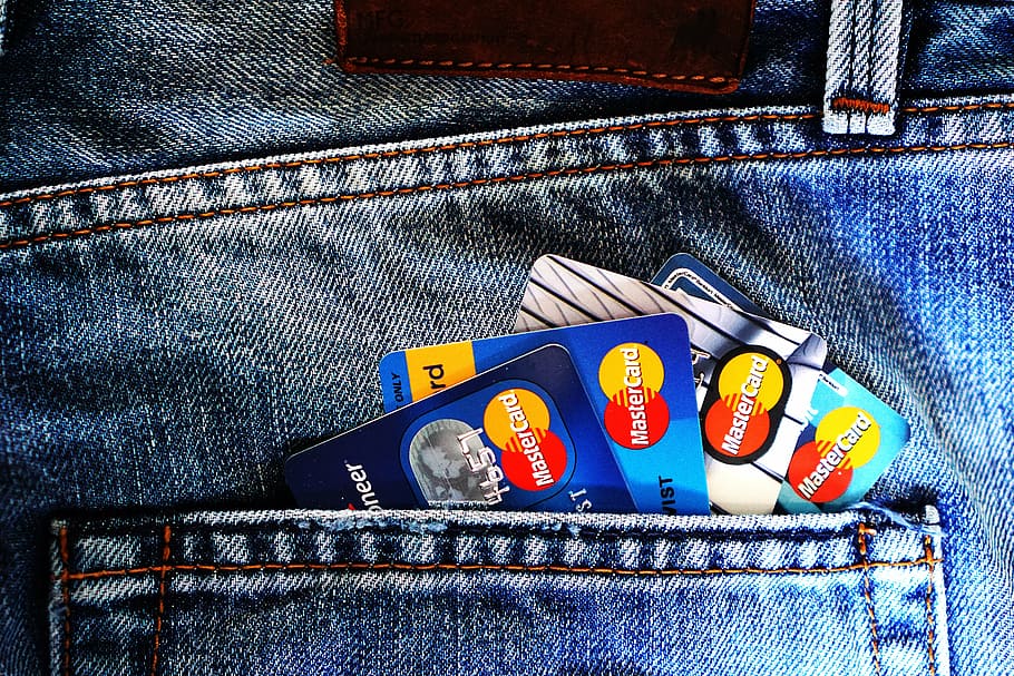 Mastercard on denim pocket, credit card, charge card, money, bank account