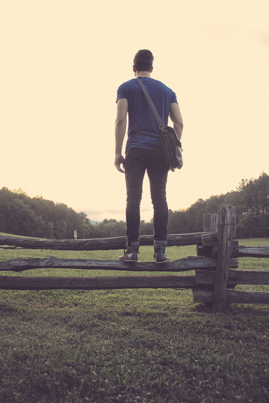man standing on wooden fence, outdoors, men, nature, one Person HD wallpaper