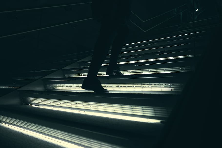 person walking on stairway, silhouette of man stepping stair HD wallpaper