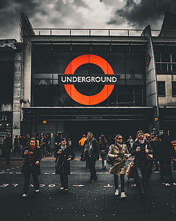 people walking in front of Underground labeled building, Underground Brixton Station building HD wallpaper