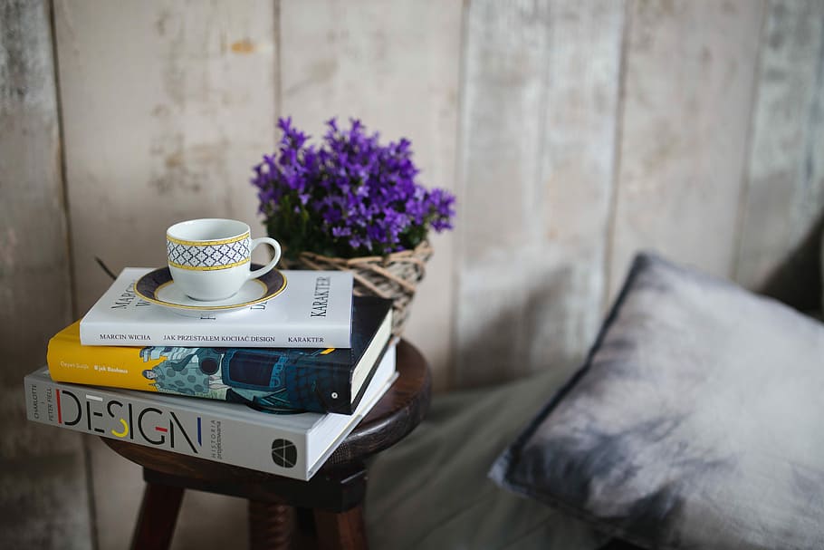 Books and purple flowers on a wooden stool by the bed, flora HD wallpaper