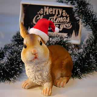 brown ceramic rabbit figurine wearing Santa hat, nicholas, christmas HD wallpaper