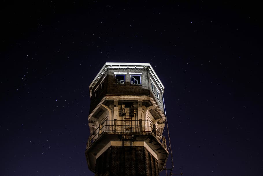 low-angled photography of tower at night, low angle photography of gray concrete tower HD wallpaper
