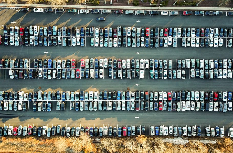 aerial view of assorted cars in parking lot, bird's eye view of vehicles in parking lot