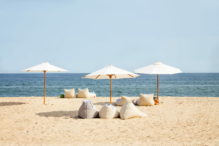 Beach bean bag chillen, three white patio umbrellas on seashore, HD wallpaper