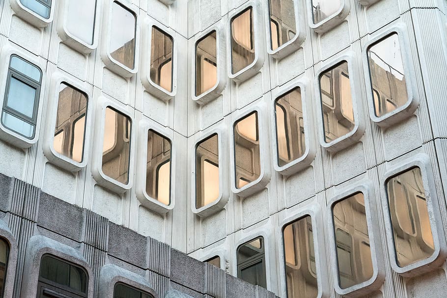 gray plastic frame, white concrete building at daytime, architecture