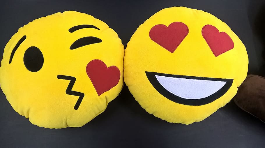 HD wallpaper: two yellow Emoji plush pillows, emoticon, smiley, kiss ...