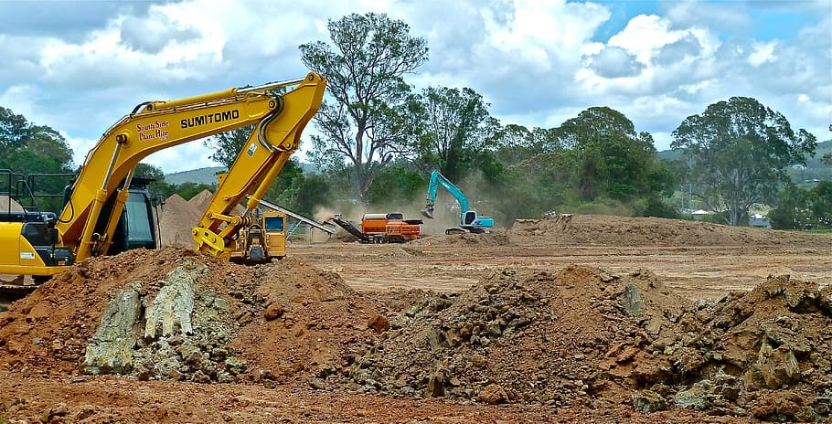 two front loaders on field, bulldozer, crawler, earth-moving HD wallpaper