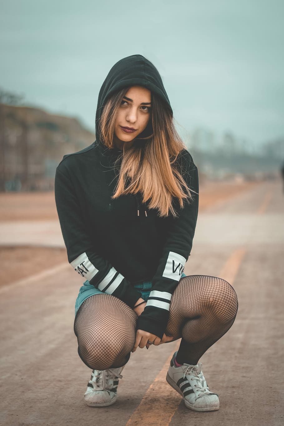 HD wallpaper: woman crouch on road, shallow focus photography of woman ...