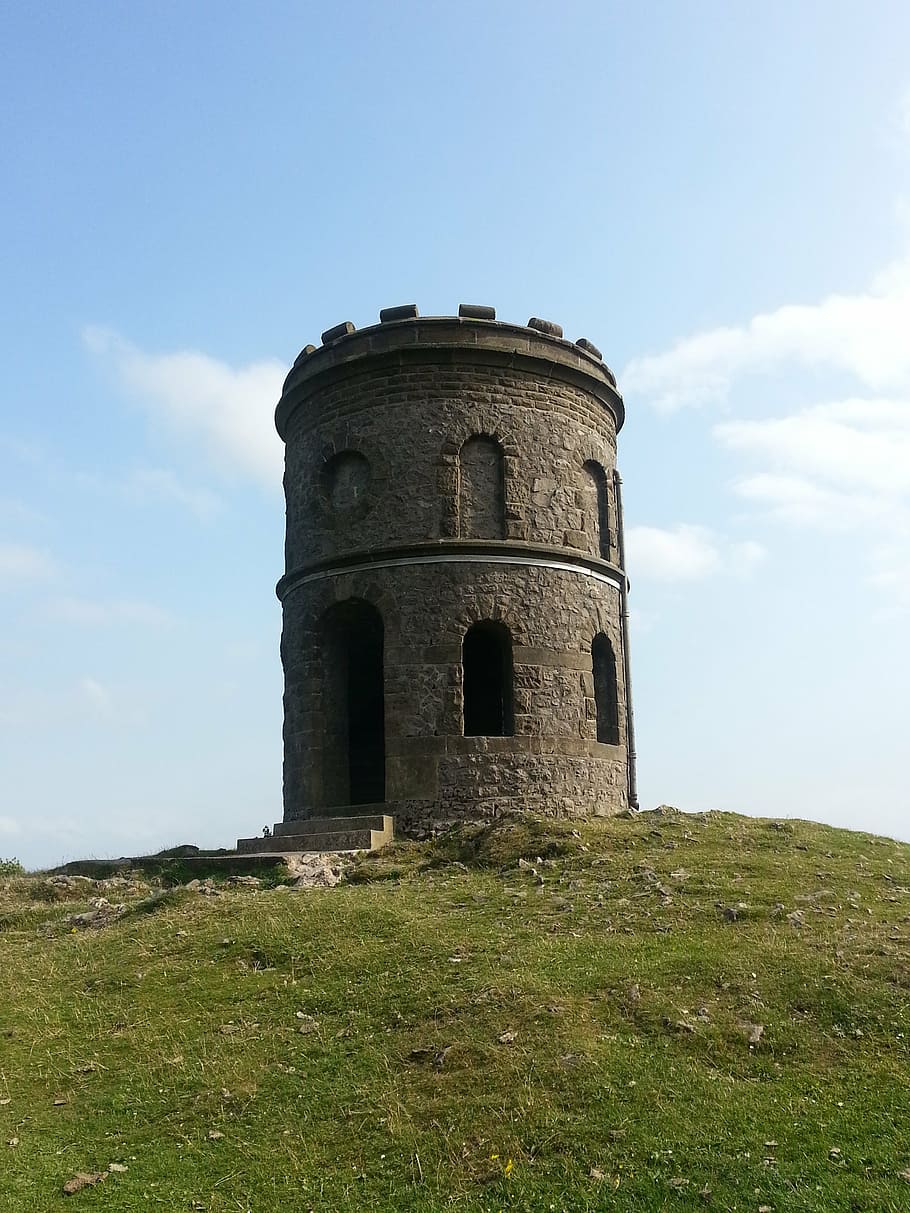tower, sky, grass, hill, architecture, skyline, clouds, landmark HD wallpaper