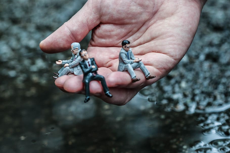 figure, miniature, man, hand, macro, human hand, human body part HD wallpaper
