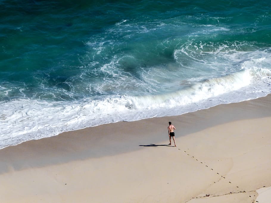 man standing beside shoreline, sea, floods, beach, wave, footprints HD wallpaper