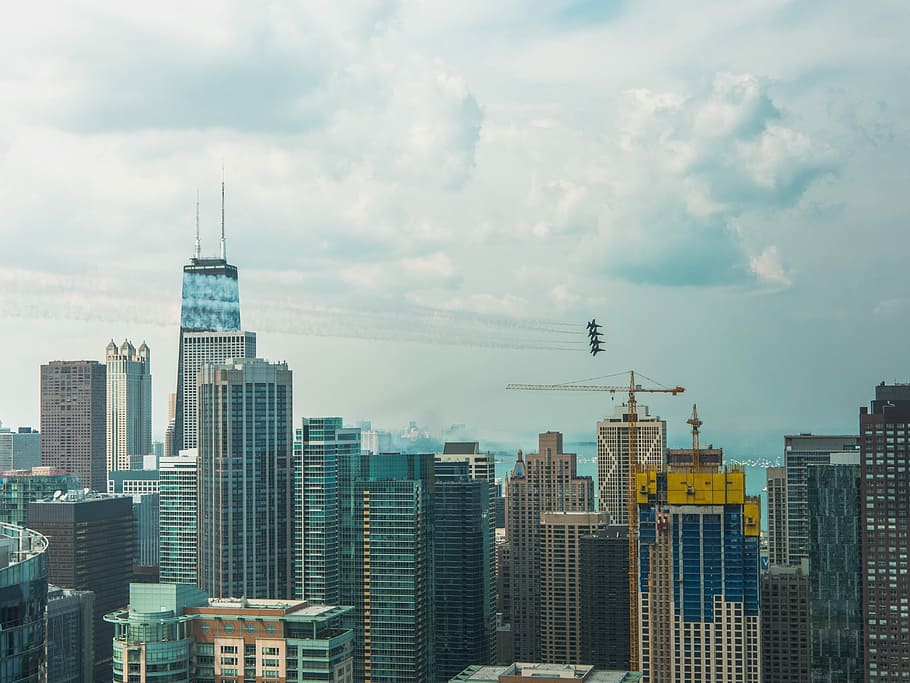 aerial photograph of high rise buildings, landscape photography of commercial buildings during daytime HD wallpaper
