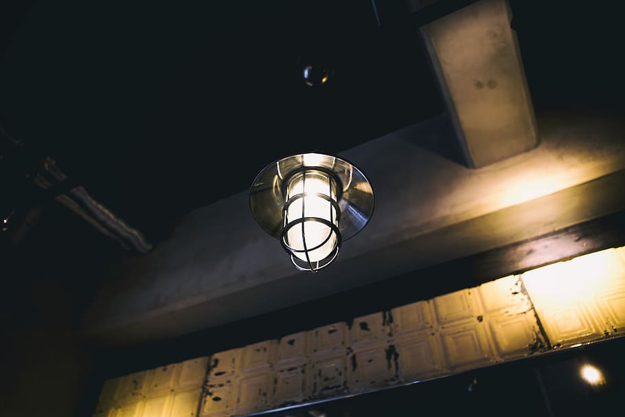 photo of light turned on, low-angle photo of gray pendant lamp beside white wall HD wallpaper