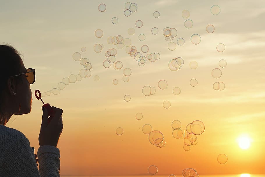 woman playing bubbles during golden hour, sunset, nature, sky HD wallpaper