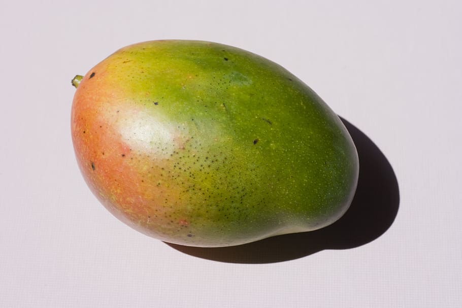 green fruit on white surface, mango, tropical, healthy eating HD wallpaper