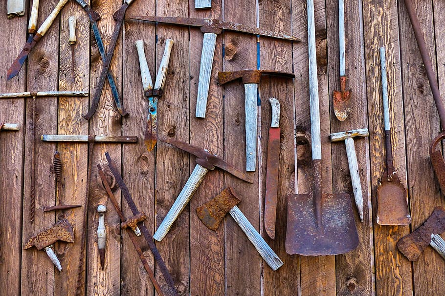 assorted gardening tools on brown surface, deadman ranch, ancient