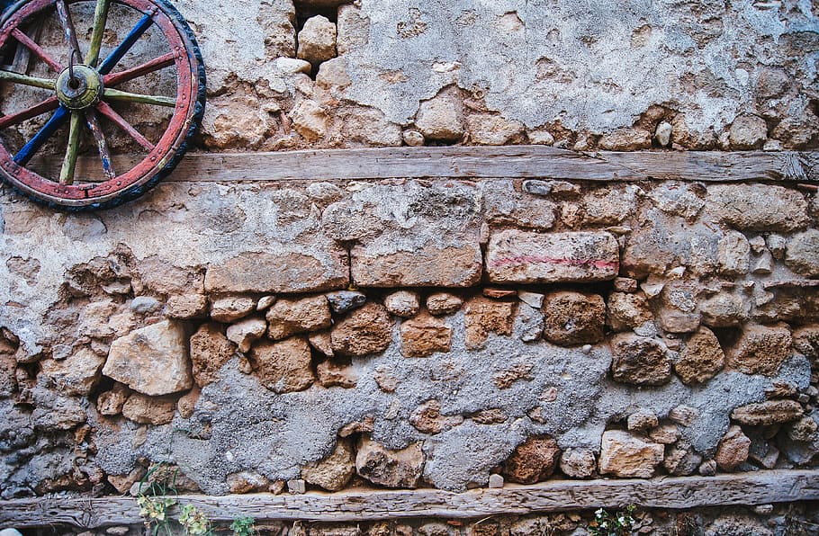 red, blue, and yellow wooden wheel, Wall, Old Stone, stone material HD wallpaper