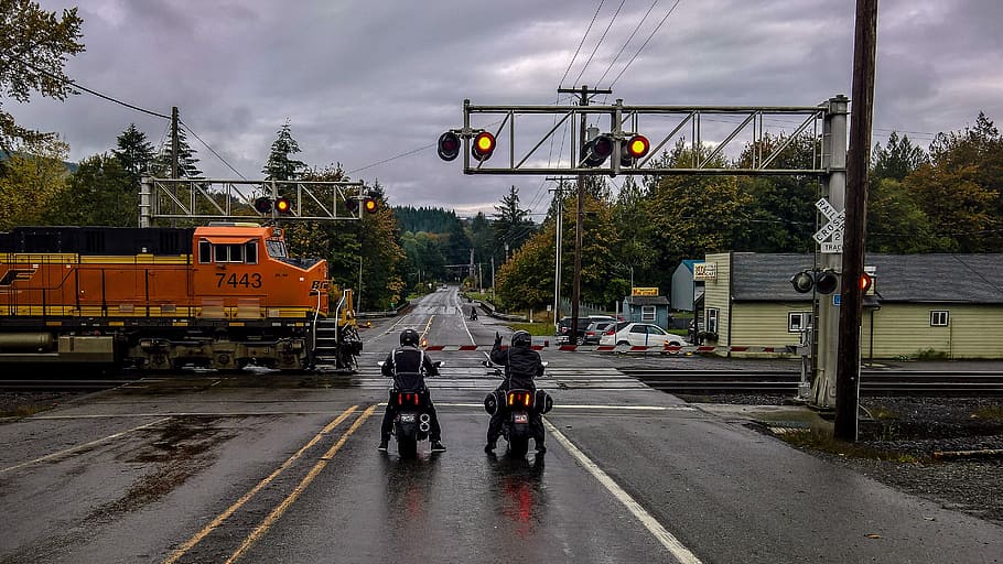 two motormen under tower, two persons riding on motorcycles, traffic HD wallpaper