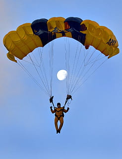 person using yellow and blue parachute, skydiver, parachuting HD wallpaper