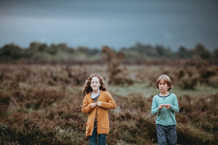 boy and girl on green field, children, forest, woodland, orange, HD wallpaper