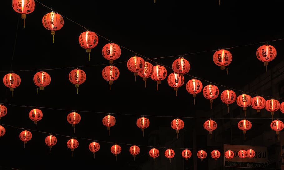 low angle photo of lighted Chinese lanterns, chinese new year