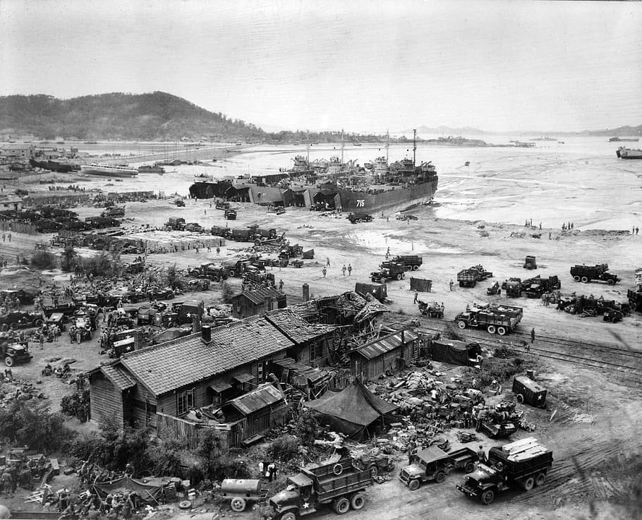 Tank landing Ships unload men at Inchon during the Korean War