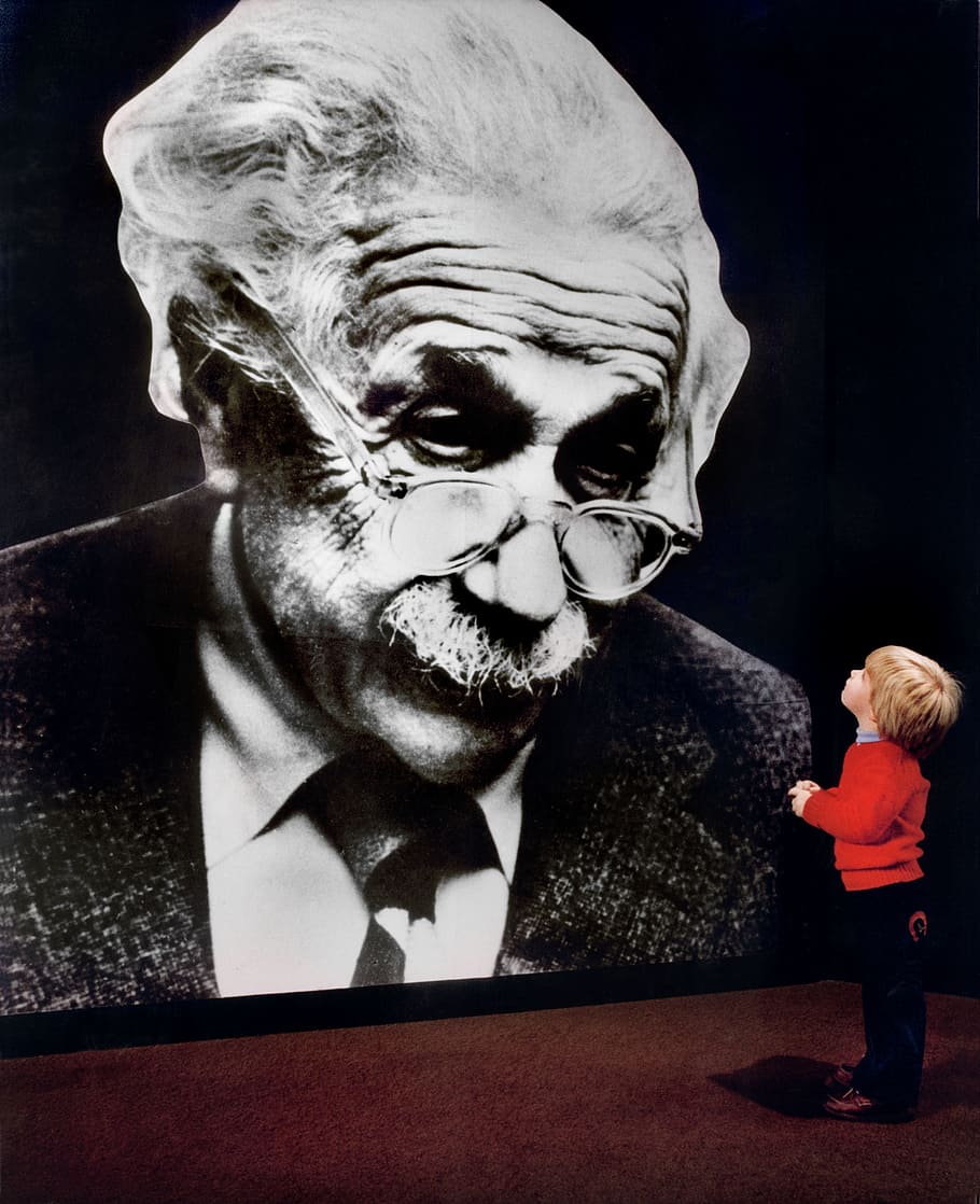 boy looking on Albert Enstein photo, oak ridge, tennessee, albert einstein HD wallpaper