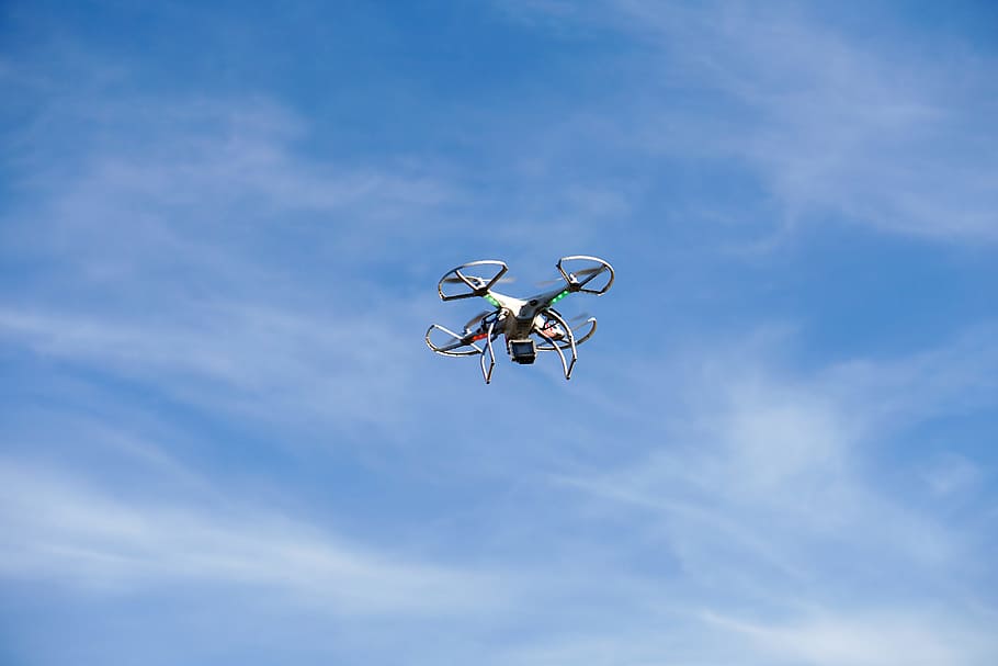 white and gray drone flying, dji, phantom, quadcopter, field