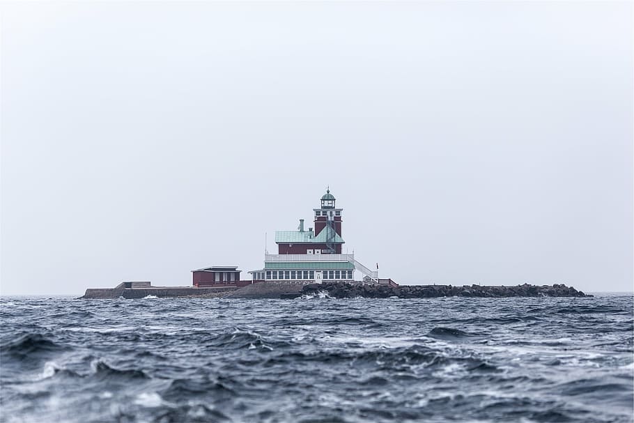 red and white lighthouse near body of water during daytime, photo, HD wallpaper