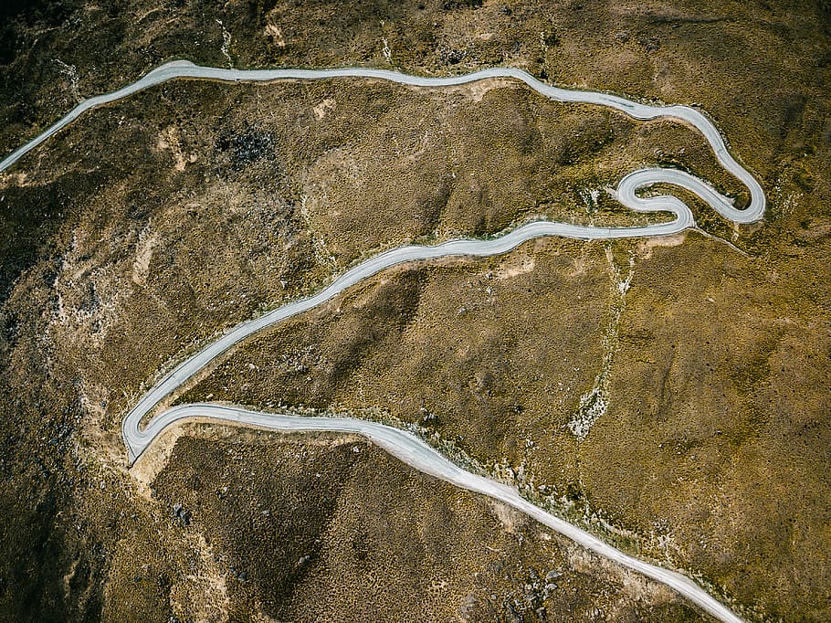 aerial photography of concrete road, aerial photography of curved winding road HD wallpaper