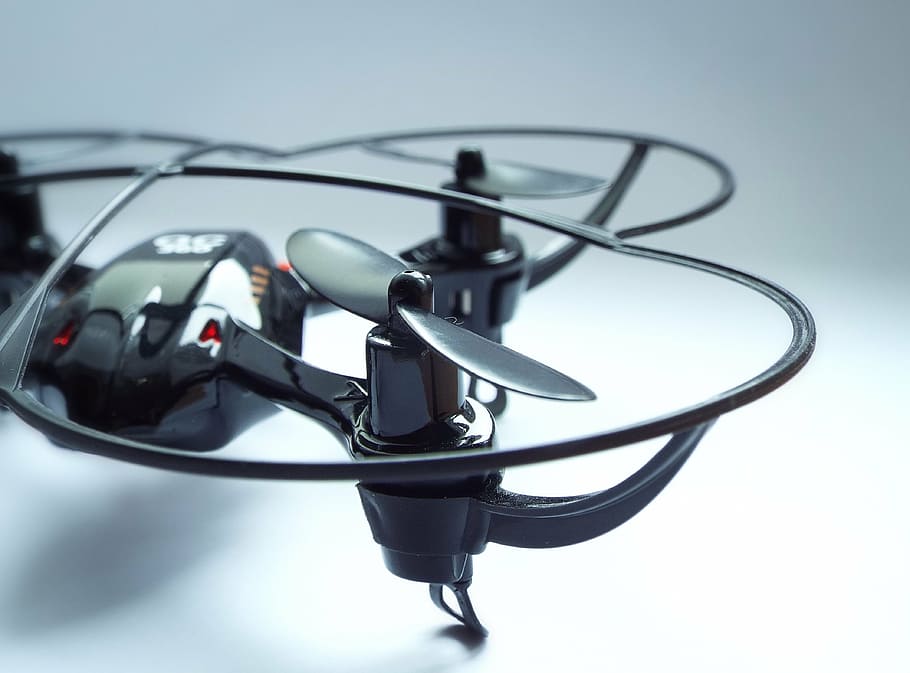 macro shot photography of black quadcopter, wallpaper, background HD wallpaper