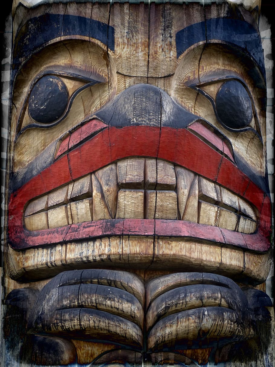 man's profile with fang embossed artwork, Totem Pole, Grunge