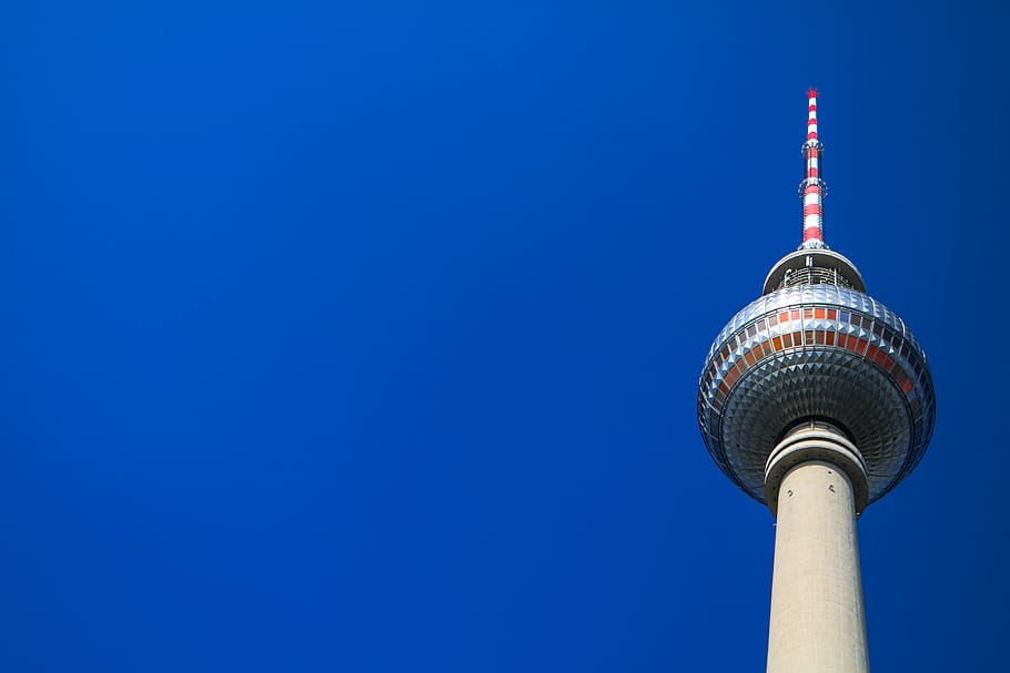 low-angle photography of tower under calm blue sky, building HD wallpaper