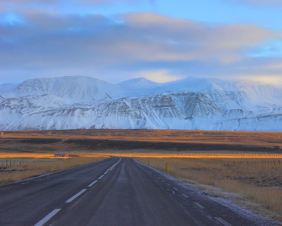 gray asphalt road in front of snow mountains, landscape photo of road and mountains during daytime HD wallpaper