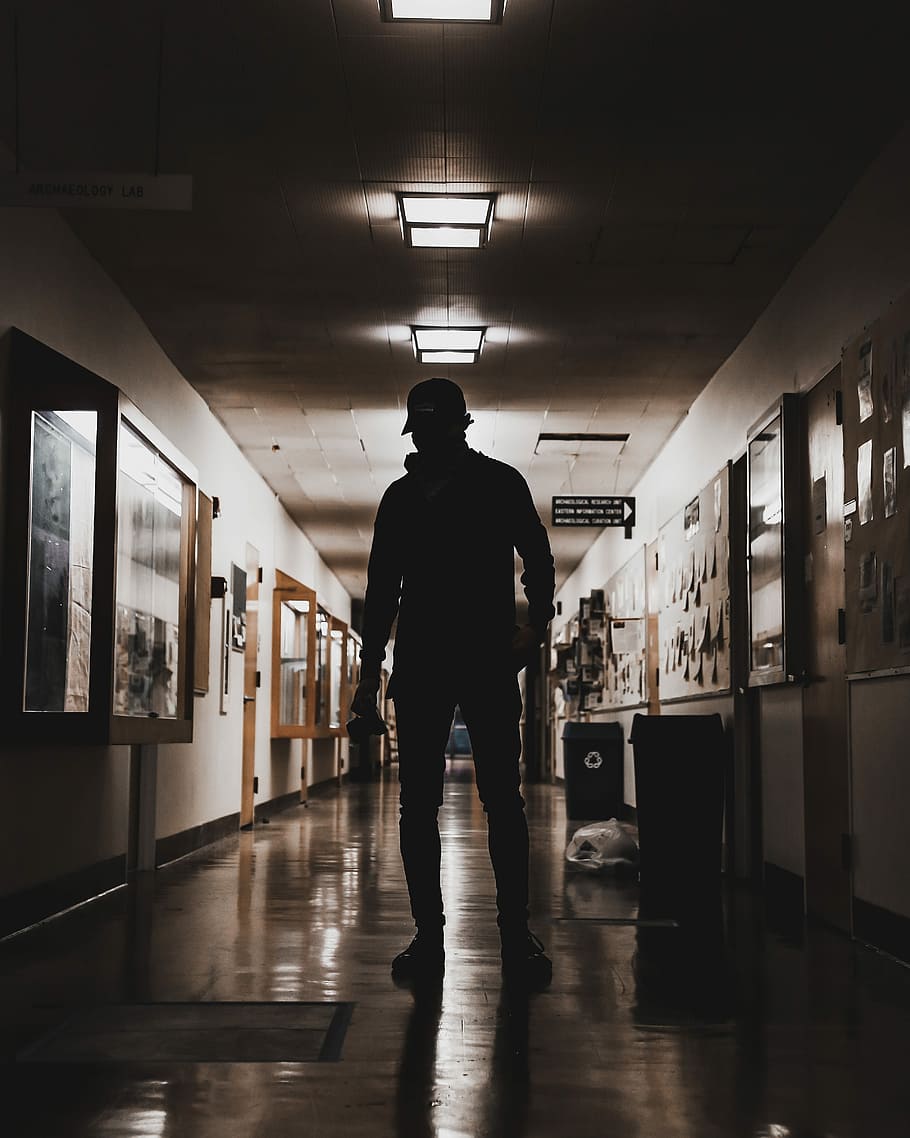 man standing on rooms pathway, silhouette of man standing on hallway HD wallpaper